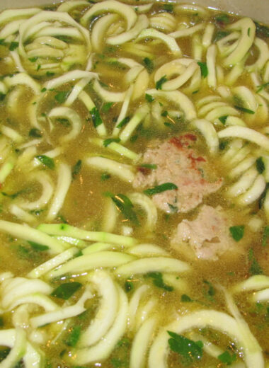 A bowl full of zoodles and chicken meatballs