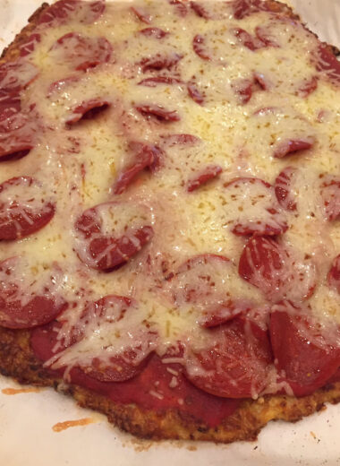 A pepperoni and cheese pizza on cauliflower crust.