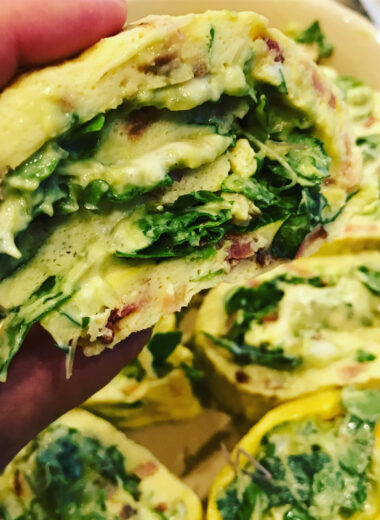 Spinach, cheese and other veggies rolled into an egg mixture and baked in the oven then rolled up to eat.