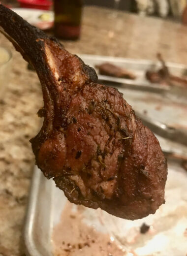 A delicious looking seared lamb chop.